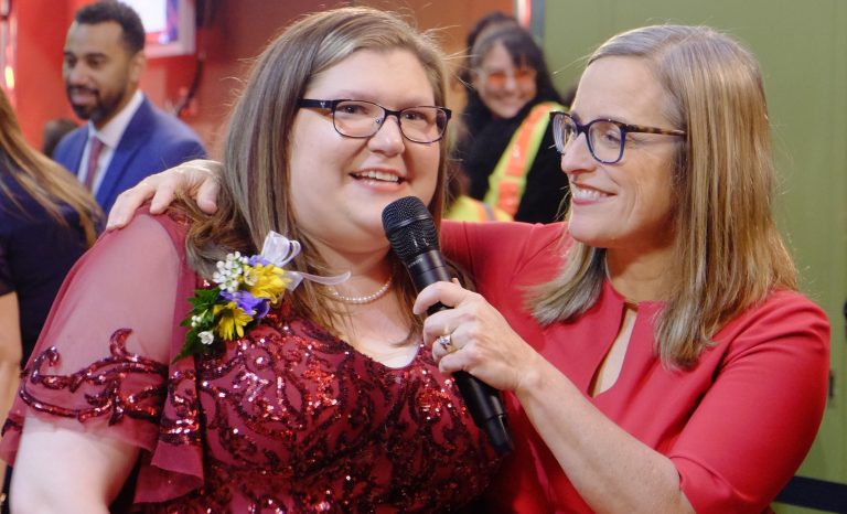 Nominees for the Crystal Apple Award walked the red carpet ahead of the event on Friday, Feb. 10, pausing for an interview for a live broadcast of the event on Capital Community Media. Christy Perry, right, superintendent of the Salem-Keizer School District helped with the interviews. (ERIC SCHUMAN/Special to Salem Reporter)